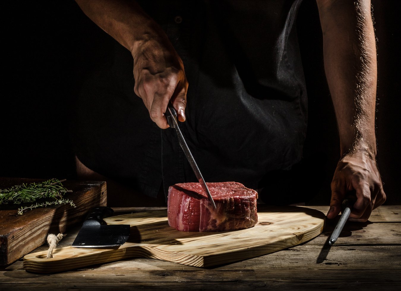 Chef butcher prepare beef steak